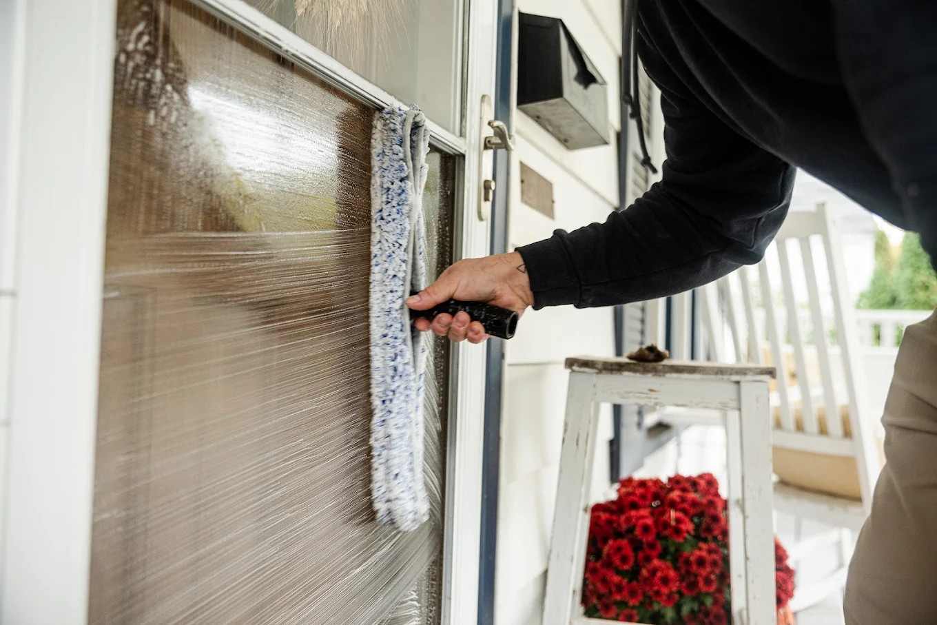 Anthony, owner of Grand Haven Window Cleaning Co., at work